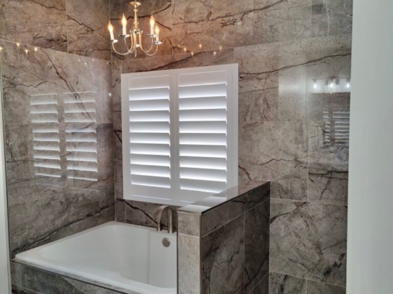 Shutters in Marble Master Bath