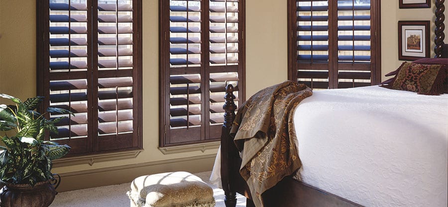 Stained wood shutters.