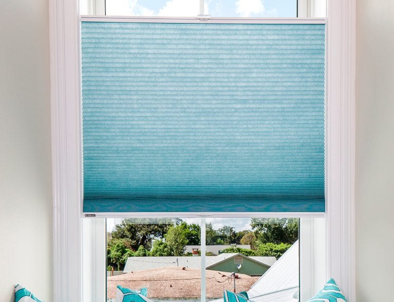 Blue cellular shades with top down bottom up.
