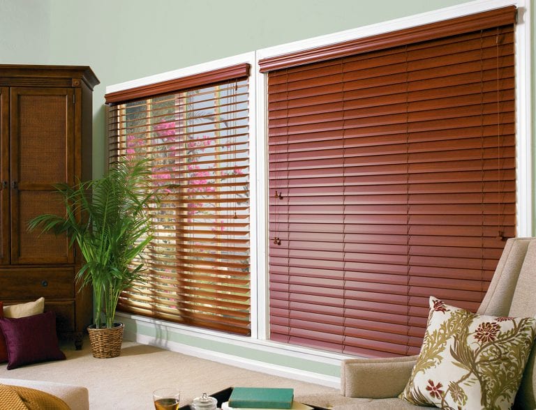 Large stained wood blinds.