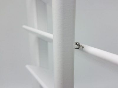 Up close picture of standard tilt rod shutters.