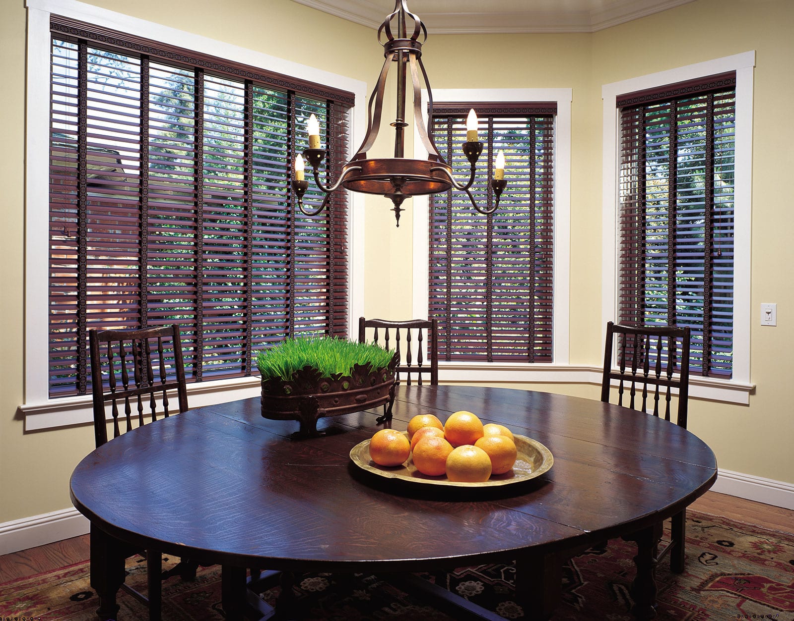 Dark wood blinds with tapes.