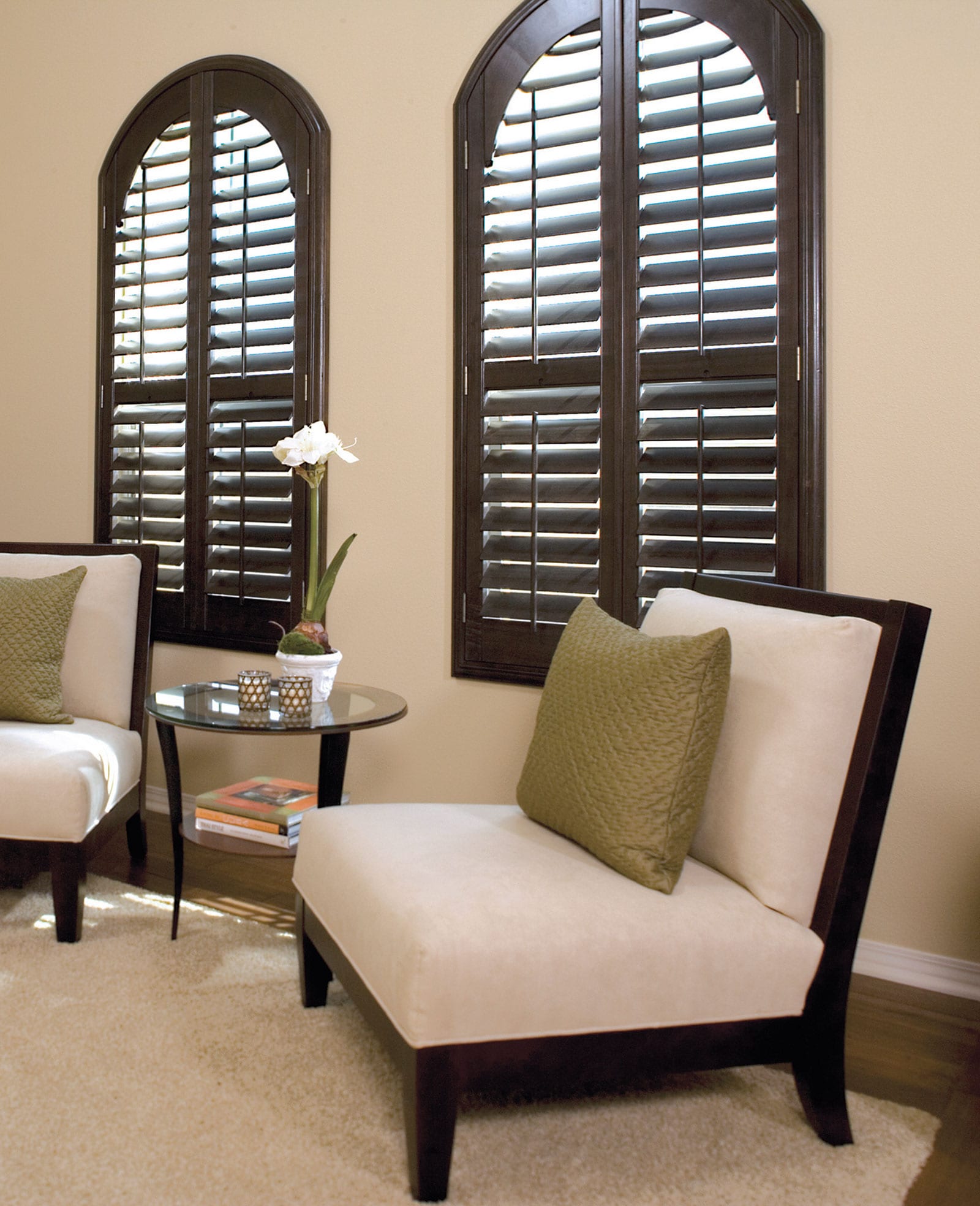 Walnut colored arched shutters.