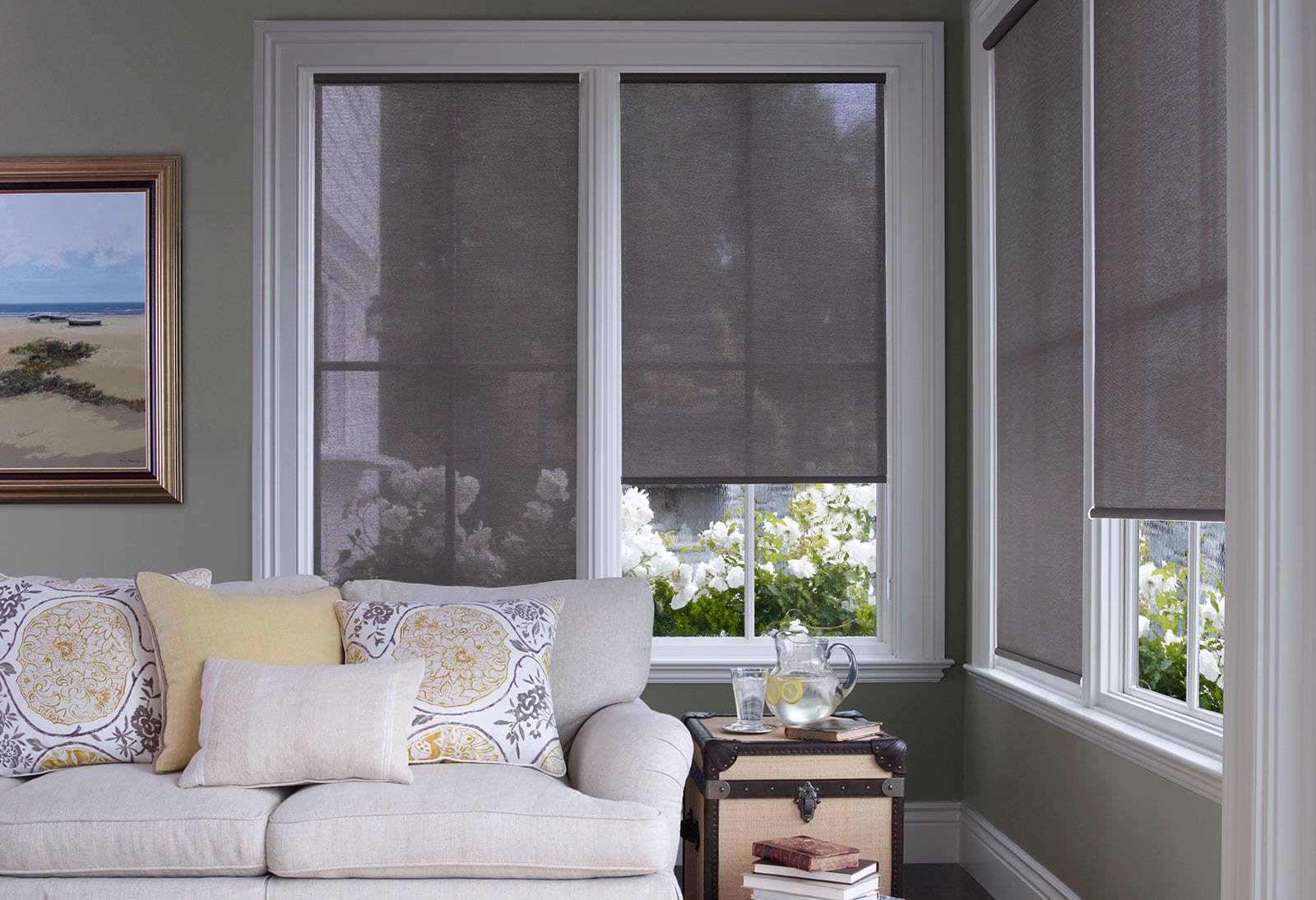 Roller shades with no top treatment.