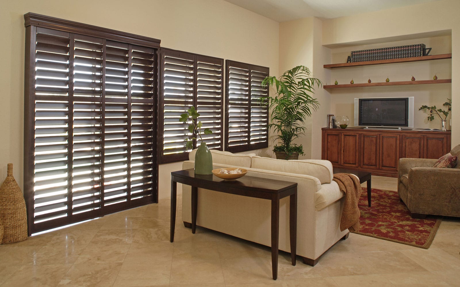 Stained bypass plantation shutters on sliding door.