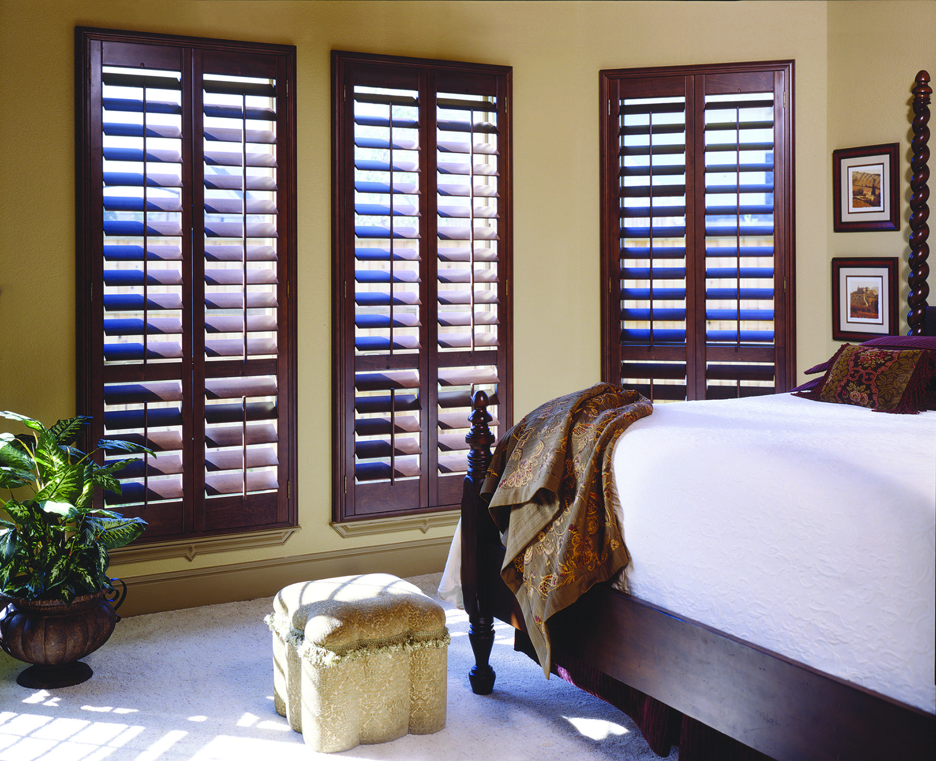 Stained wood shutters.