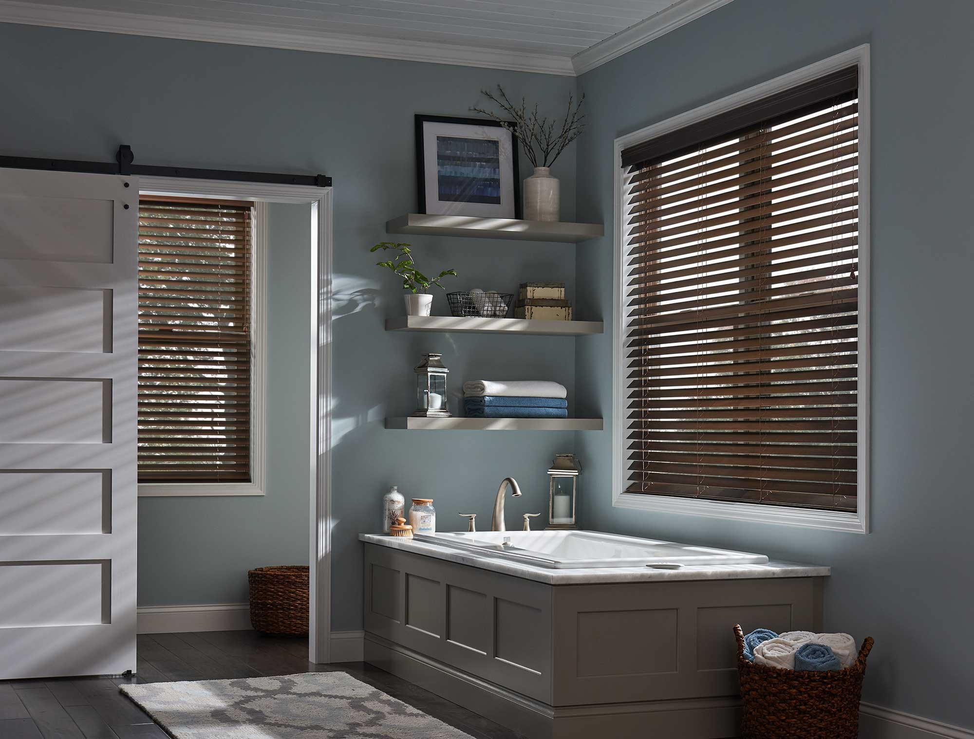 Stained wood blinds in a bathroom.