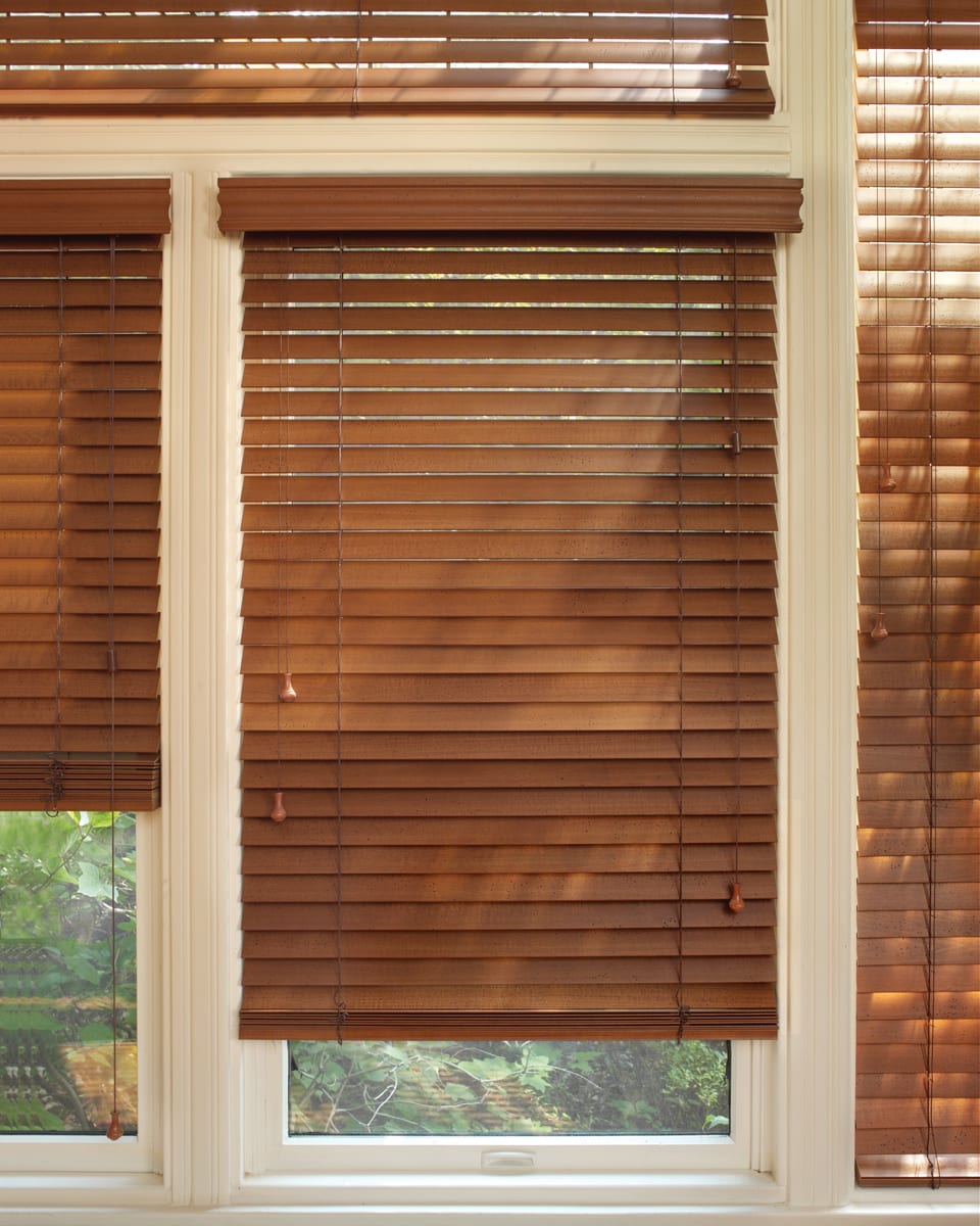 Wood blinds with decorative valences.