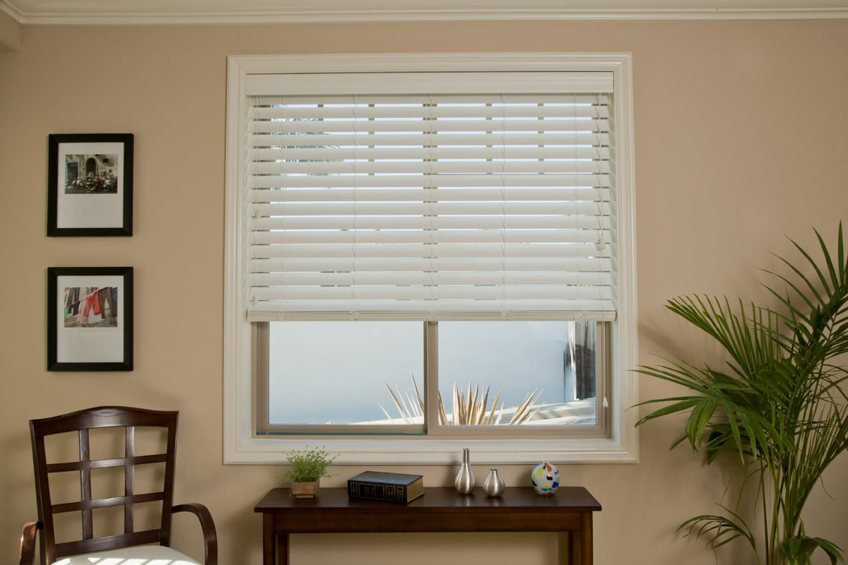 2" faux wood blinds in a hall.