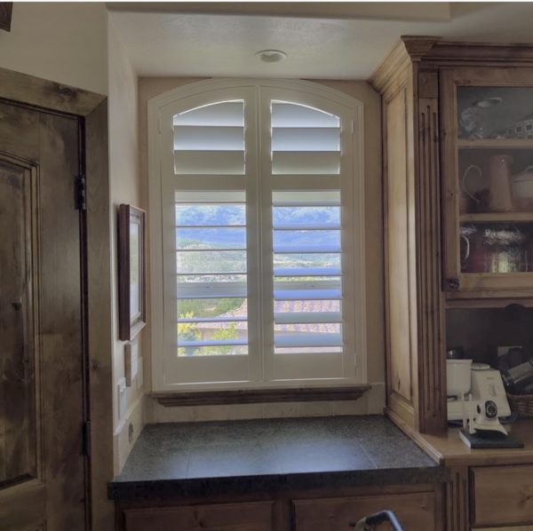 Hidden tilt wood shutters for arched windows in utah