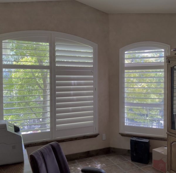 Hidden tilt shutter and window covering options for arched windows in utah
