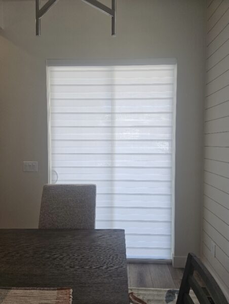 lightfiltering banded shades closed for privacy in dining area